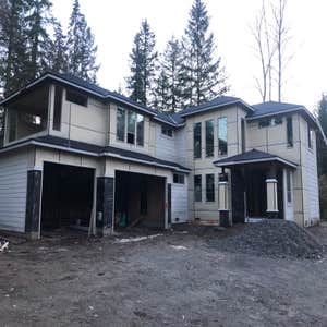 Siding by Diamond City Construction LLC #4 New House Wrap and Siding