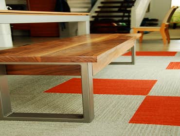 Project photos from Dagan Design & Construction Custom steel and walnut dining benches
