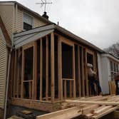 Maple Ave. Remodel of house outside and inside.
New front porch with small bump out on left side of front of house. Also with a 15'x25' addition on le