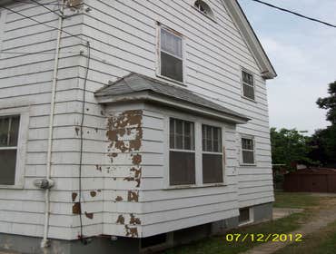 Brilliant Painting, LLC Exterior Project 1 Before and after photos of a full house that has been power washed, scraped, hand sanded, primed, and painte