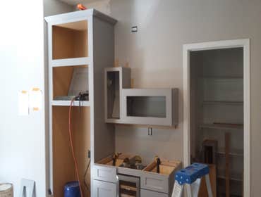 Photos from Love Remodeling Llc Built in custom entertainment center and custom oak floating shelves