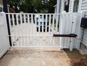 White Iron Gate with Automatic Operator