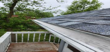 Hydro-Flo Hydro-Flo gutter guards installed by 22nd Century Roofing.