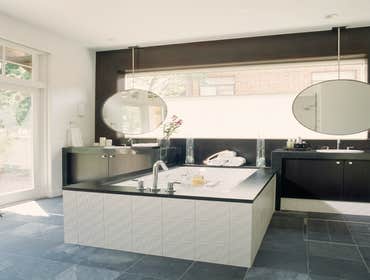 Sub Zero/Wolf International Design Competition Winner Graced with an eclectic Spanish Mission Exterior, this extraordinary kitchen allows for the mothe