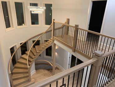 Photos by General Hardwood Flooring Inc #1 White oak 5”x3/4 installed, sanded and refinished with custom stain color