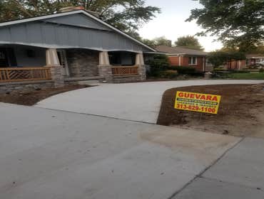 Photos by Guevara Alexander #1 A curated collection of our high-end residential concrete work, including stamped patios, exposed aggregate driveways, w