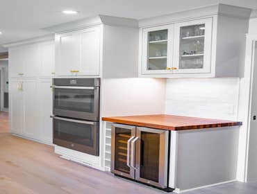 Photos by Albrecht, LLC #1 Through strategic space planning, thoughtful material selections, and custom craftsmanship, this first-floor renovation tran