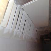 Build custom size bookshelves Build 3 bookshelves per customer specifications (design, sizing and finish). The customers just moved into a brand new ho