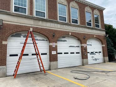 Photos by Northeast Eco Blasting #15 Firehouse 3 garage doors paint removal