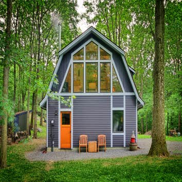 Writer's Studio The conversion of this iconic American barn into a Writer’s Studio was conceived of as a tranquil retreat with natural light and lush v