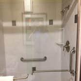 Best Western Plus - Sutter House Tub to shower conversion with design upgrades.
-Remove existing tub, surround, and hardware.
-Install Seamless Wall