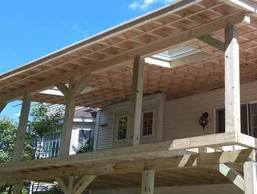 Photos by Better Home Improvement #8 12 x 20 ft deck with roof and sky lights