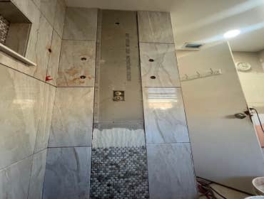 Photos by Blankenberg Flooring & More LLC #8 Removed old shower area and gave a new walk in shower. We didn’t install new flooring in the bathroom area