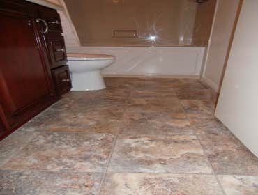 Hallway Bathroom This bathroom was completely re-done. The challenge was to give this large family a beautiful, functional, and durable bathroom in a 