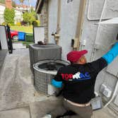 TOP AC INC