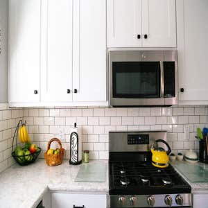 Clowdus Kitchen This client came to me with a vision for a custom kitchen that would make the space feel larger and maximize storage. We designed...