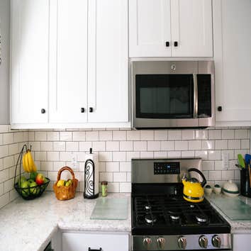 Clowdus Kitchen This client came to me with a vision for a custom kitchen that would make the space feel larger and maximize storage. We designed pull-