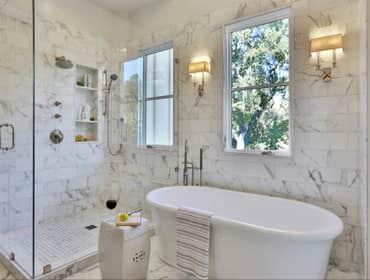 Photos by Coast Builders, Inc #1 Construction of 9800 sf of a new single family home,