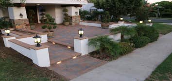 Photos by ELITE REMODELING & DEVELOPMENT INC #3 Transform your home's curb appeal with a stunning entrance remodel featuring gorgeous, custom laid pave