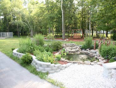 The Getaway This pond is located in the front yard of the residence and offers a quick escape from the daily grind. Enjoyed by both the homeowners and 