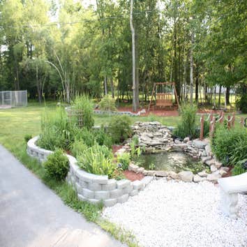 The Getaway This pond is located in the front yard of the residence and offers a quick escape from the daily grind. Enjoyed by both the homeowners and 