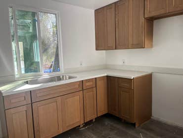 Photos by Pan Shi Construction Inc #1 Converted an existing garage into a fully functional Accessory Dwelling Unit (ADU), The project included framing 