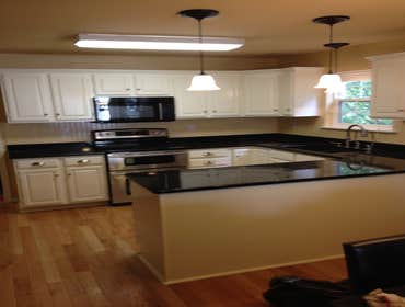 Kitchen photos from Spraymasters Inc added Crown