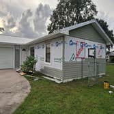 Photos by Florida Roofing and Renovations #1 Installing vinyl siding over and old T1-11 siding