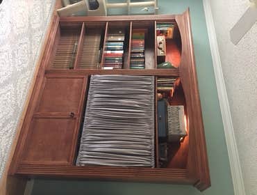 Stained Shelving w/ adjustable shelves and recessed lighting