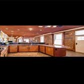 Photos by New Earth LLC #1 Restoration of a 1890's row house. Kitchen is brazilian lacewood and mahogany and the open space concept keeps the exposed b