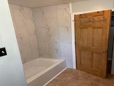 Photos by Small Valley Contracting #1 Removed pre-existing tub and tile on walls. We installed new tub, tile, tub fixtures.