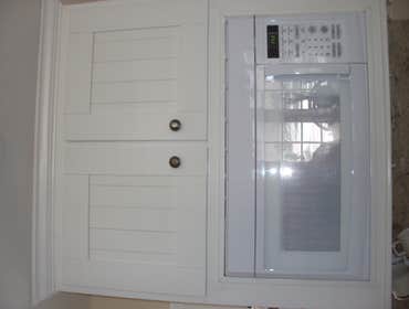 Bonnie's House These are some cabinets we built and refaced to match. We also built a custom bookcase in a room off of the kitchen. and we built the c