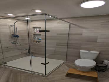 Photos by Spera LLC #1 Limestone bathroom remodel.