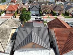 Photos by Gold Star Miami Corp #1 metal roof panels all are . 25 years warrantee