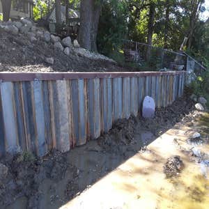 Photos by Excavo Construction Co #8 Sheet pile shoreline