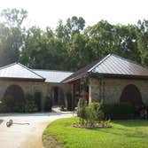 Lockey Residencs 26 gauge standing seam. Energy Star rated color. Replacement of failed asphalt shingles.