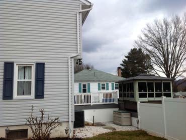 Project photos from Griesemer Construction The exterior of this porch was old deteriorated concrete with a aluminum posts & roof.Now it's trex lumber d
