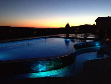 Reverse negative edge Travertine deck, spa, reverse negative edge play pool,