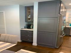 Photos by Es Carpentry Inc #1 Basement and first Floor complete gut and Remodel
