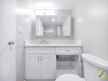 Contemporary Apartment Bathroom Today we have a contemporary apartment bathroom we completed last summer in Alexandria!
We loved the frameless mirror a