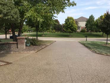 exposed aggregate Driveway Photo by Potoroka Concrete Macomb MI