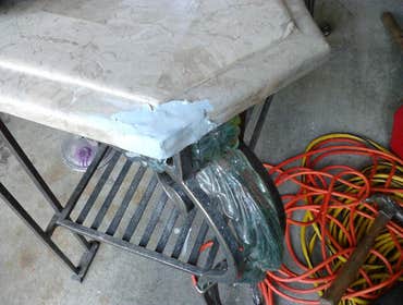 composite table broken corner