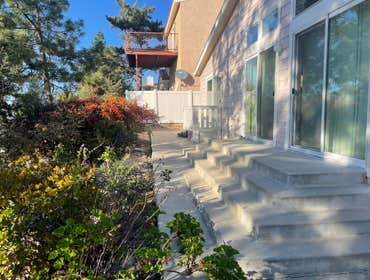 Pavers system Pavers system, planters, drainage, custom railing, exterior paint, vinyl fence and gate.