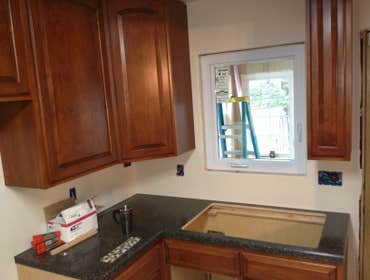 Adam R. Nardecchia Electrical Service Project In the first few pictures is a brand new maple kitchen being installed with custom counter tops which are
