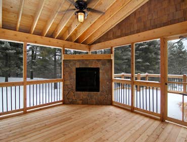 Lockridge Residence This new Transitional Custom Home was built on the owners heavily wooded lot and designed to maintain the woodsy feel while taking 