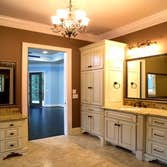 KingsBridge Lot 79 This beautiful home is located in the Simpsonville community of KingsBridge, a gated community of elegant Traditional and European s
