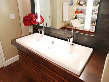 Double faucet bath sink