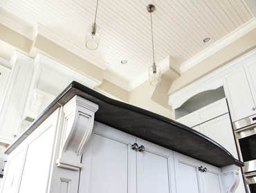 Baine Contracting Inc Project Multiple jobsites - showing kitchens, interior and exterior trim work, new homes, bathrooms, tile work, wood and iron ra