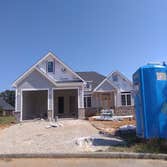 Photos by A-earlybirds #3 Asphalt shingle installation on the doghouse located in the front section of the house and over the garage..