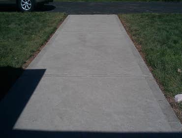 Project photos from Hollis Contracting Removed the existing concrete side walk and repoured and finished it with new concrete.
